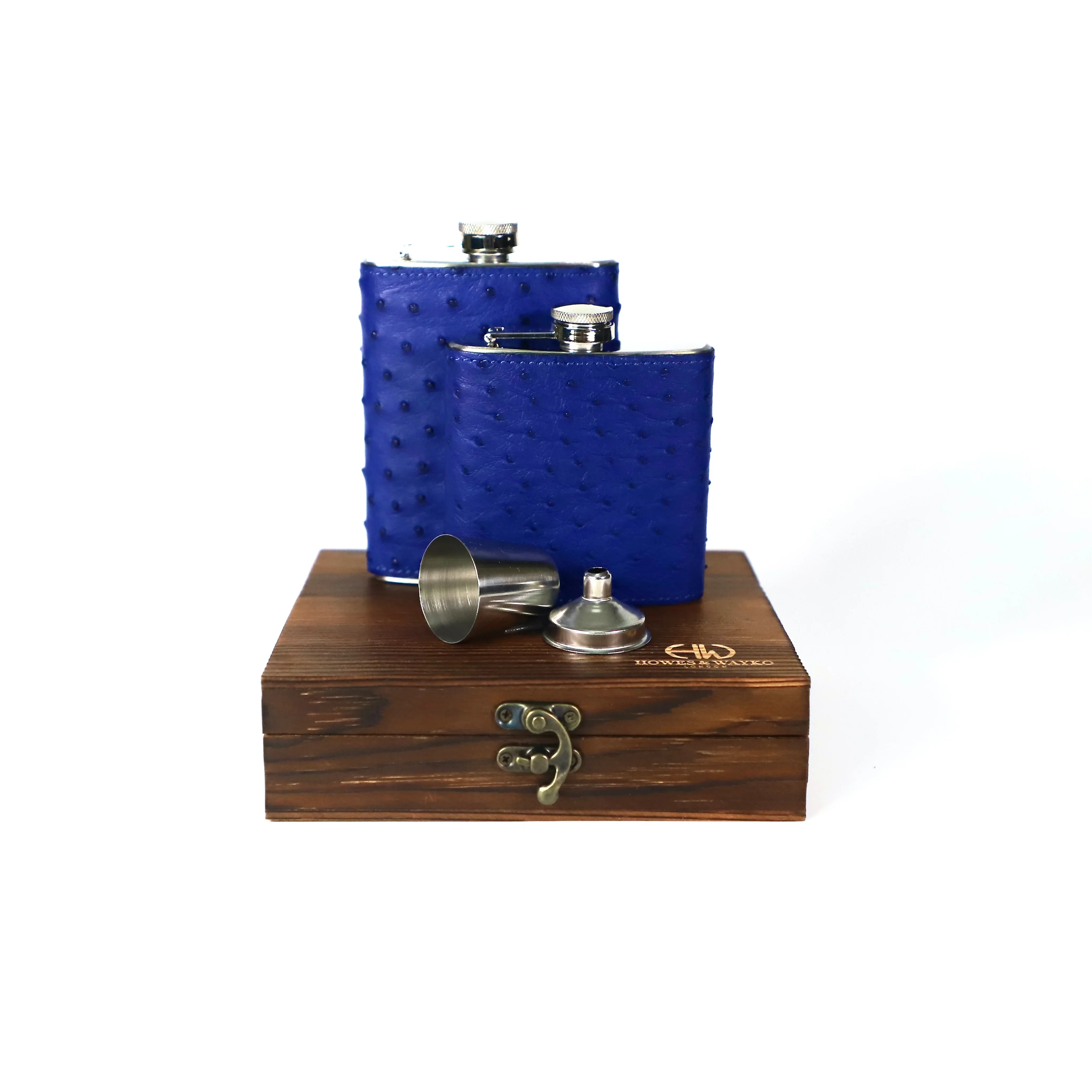 Blue Ostrich flask with wooden box on a white background
