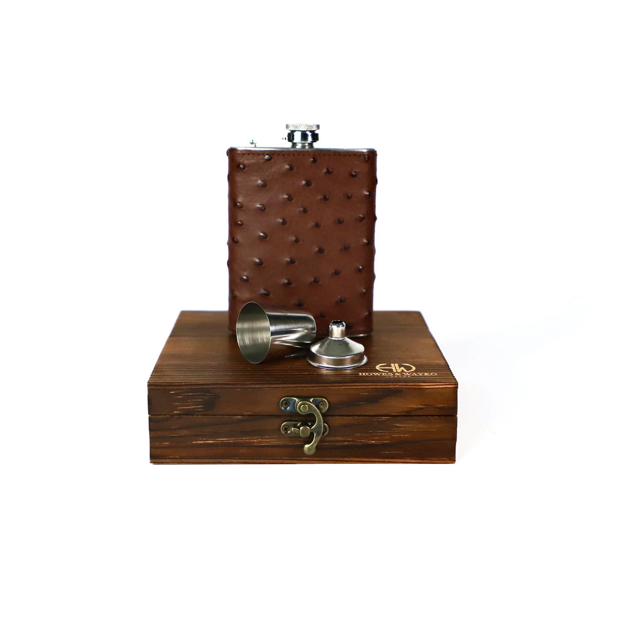 Brown Ostrich leather flask with wooden gift box base and silver shot glass on a white background