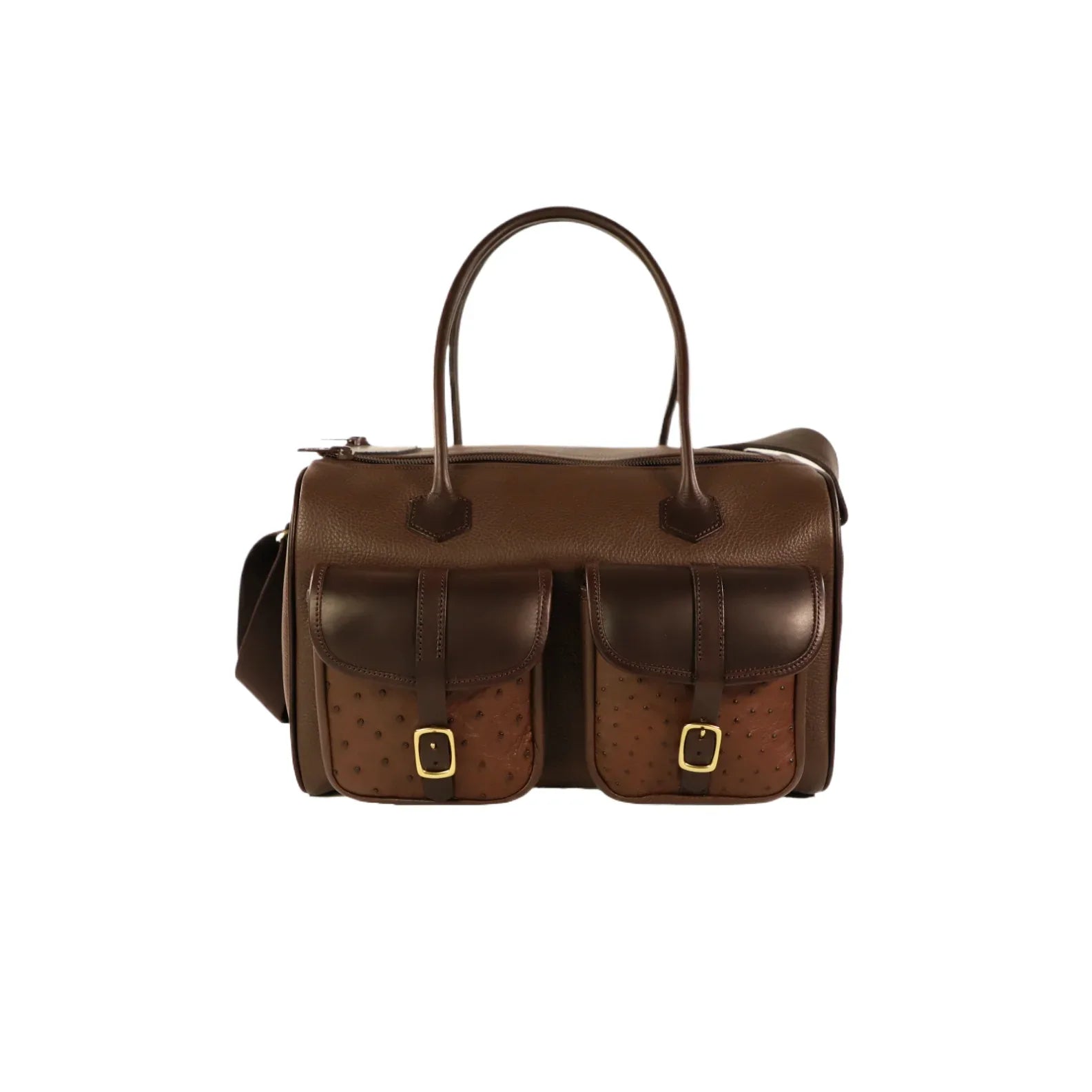 Brown leather bag with two front pockets finished with a with over the shoulder straps and comfortable handles, on a white background