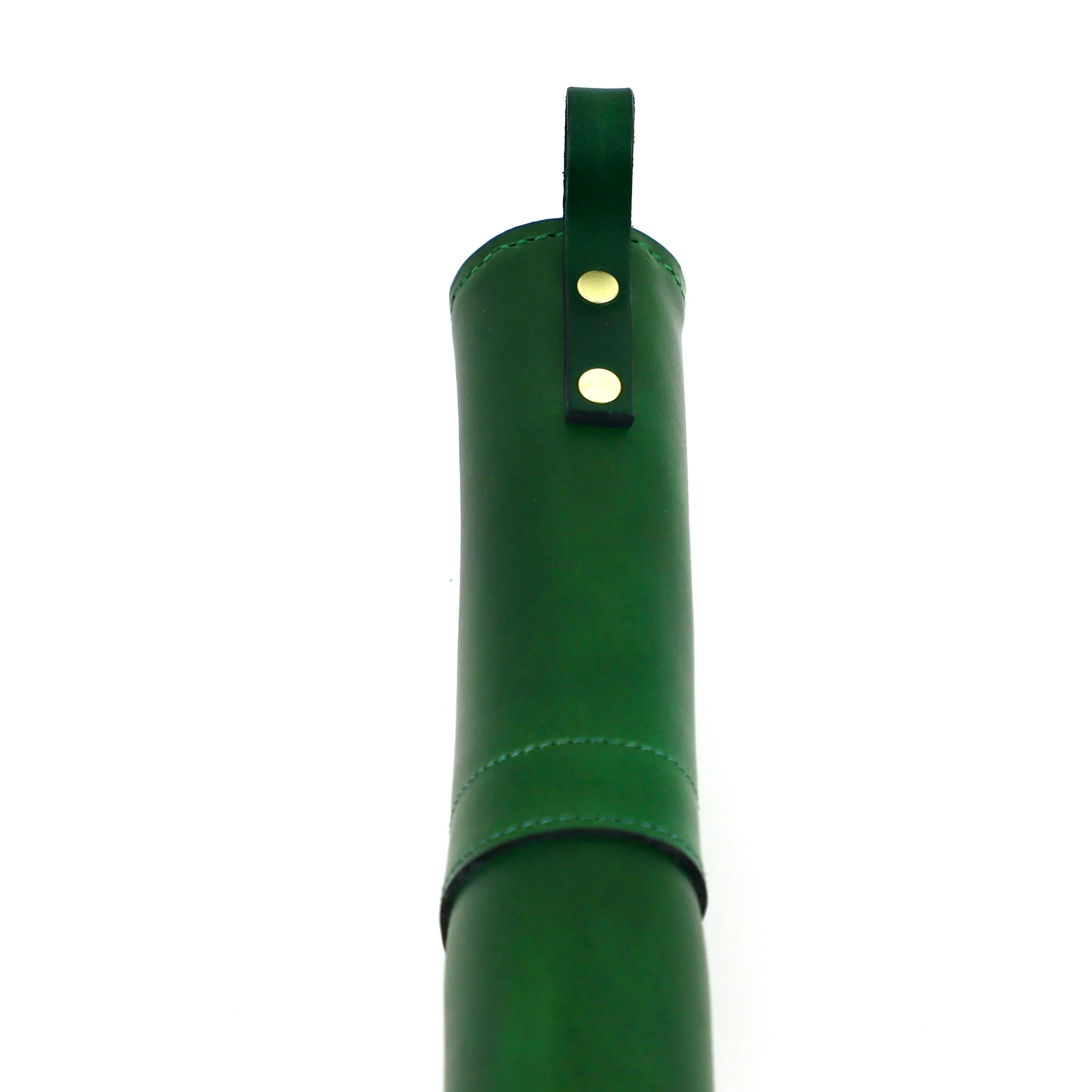 gun slip in green with matching mock crocodile skin. It features a luxurious sheepskin lining, a substantial outer pocket and eye-catching brass hardware tip of the gun slip
