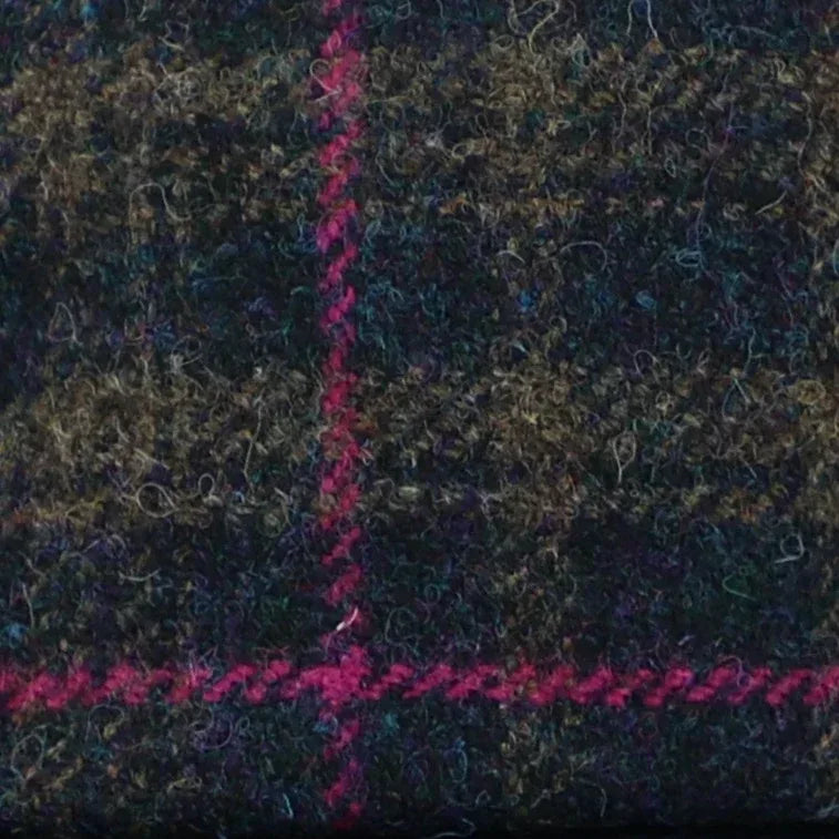 close up of different colours used in tweed cap