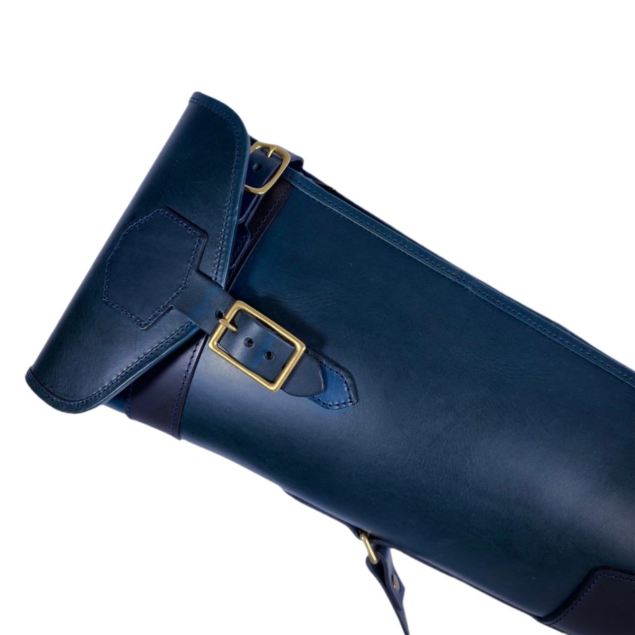 Blue leather slip with a gold buckle on a white background