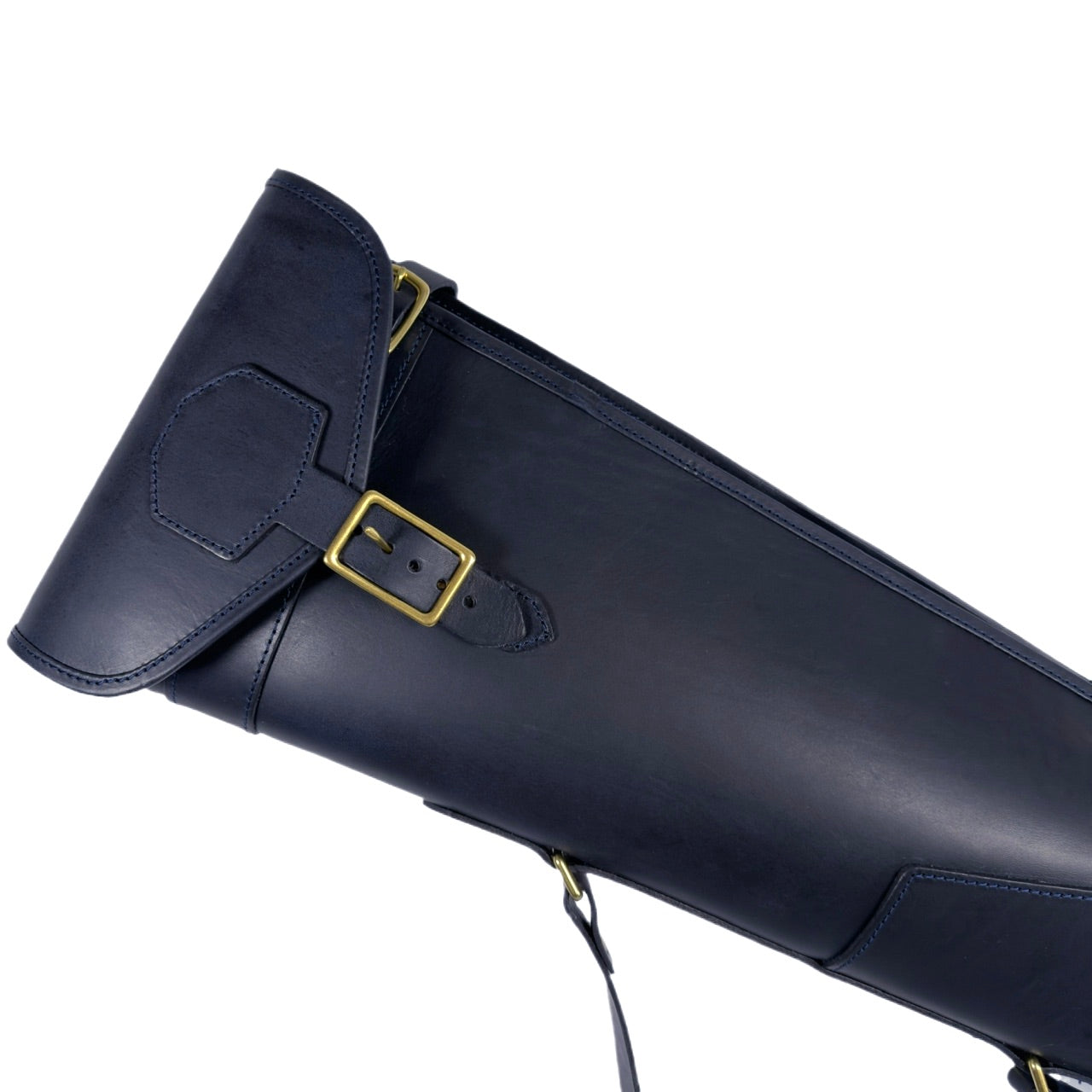 Navy leather shotgun slip with brass buckles on a white background