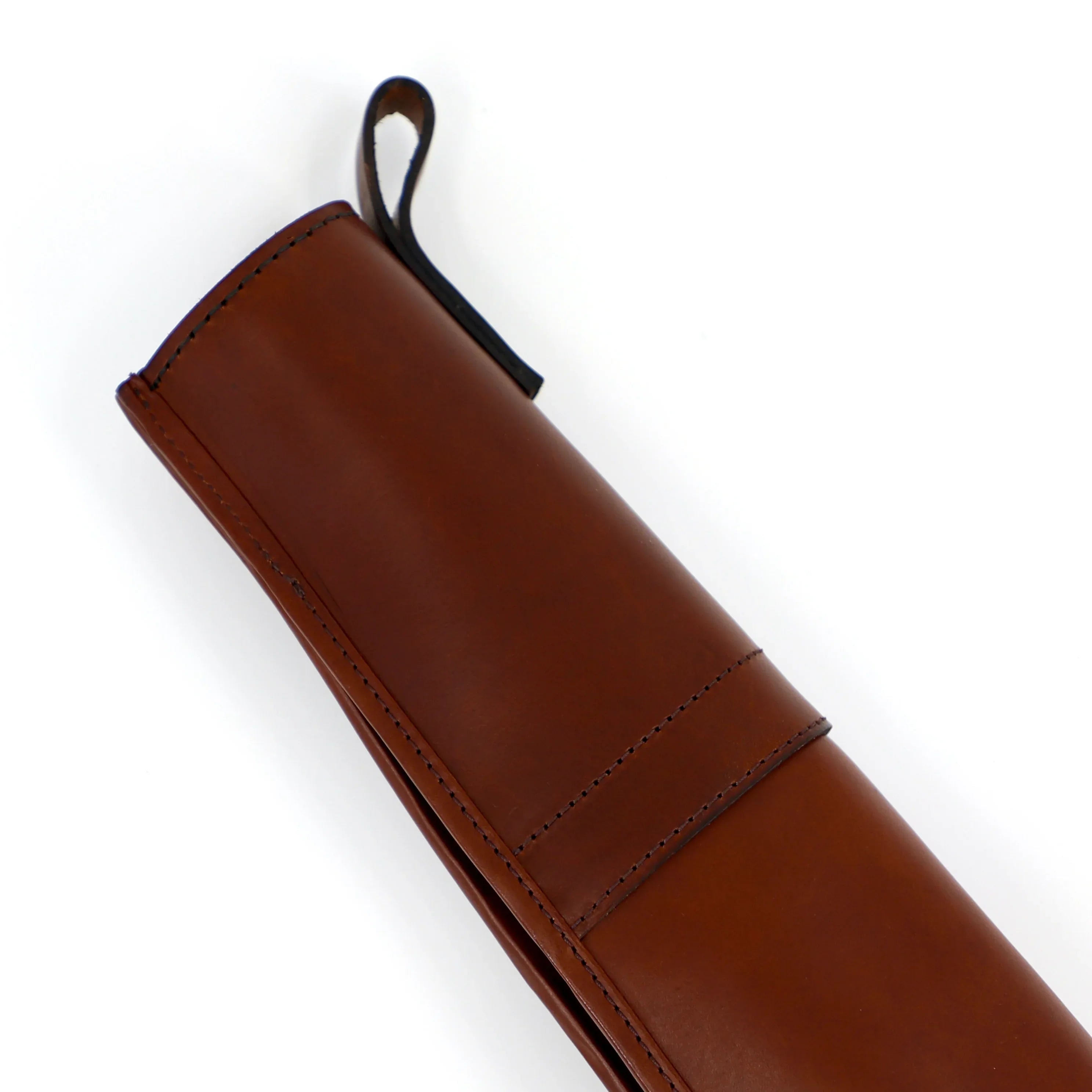 flip side of papaya tan leather gunslip end