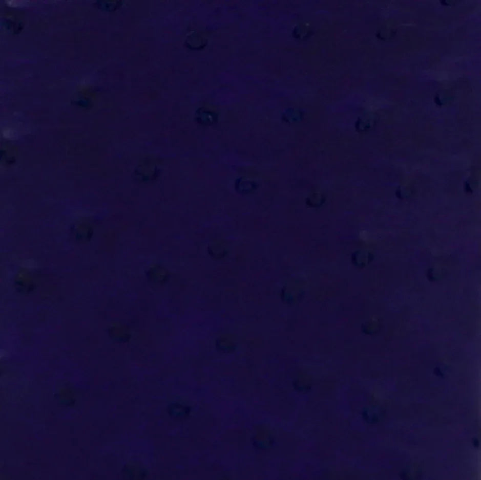 A close up of a purple leather