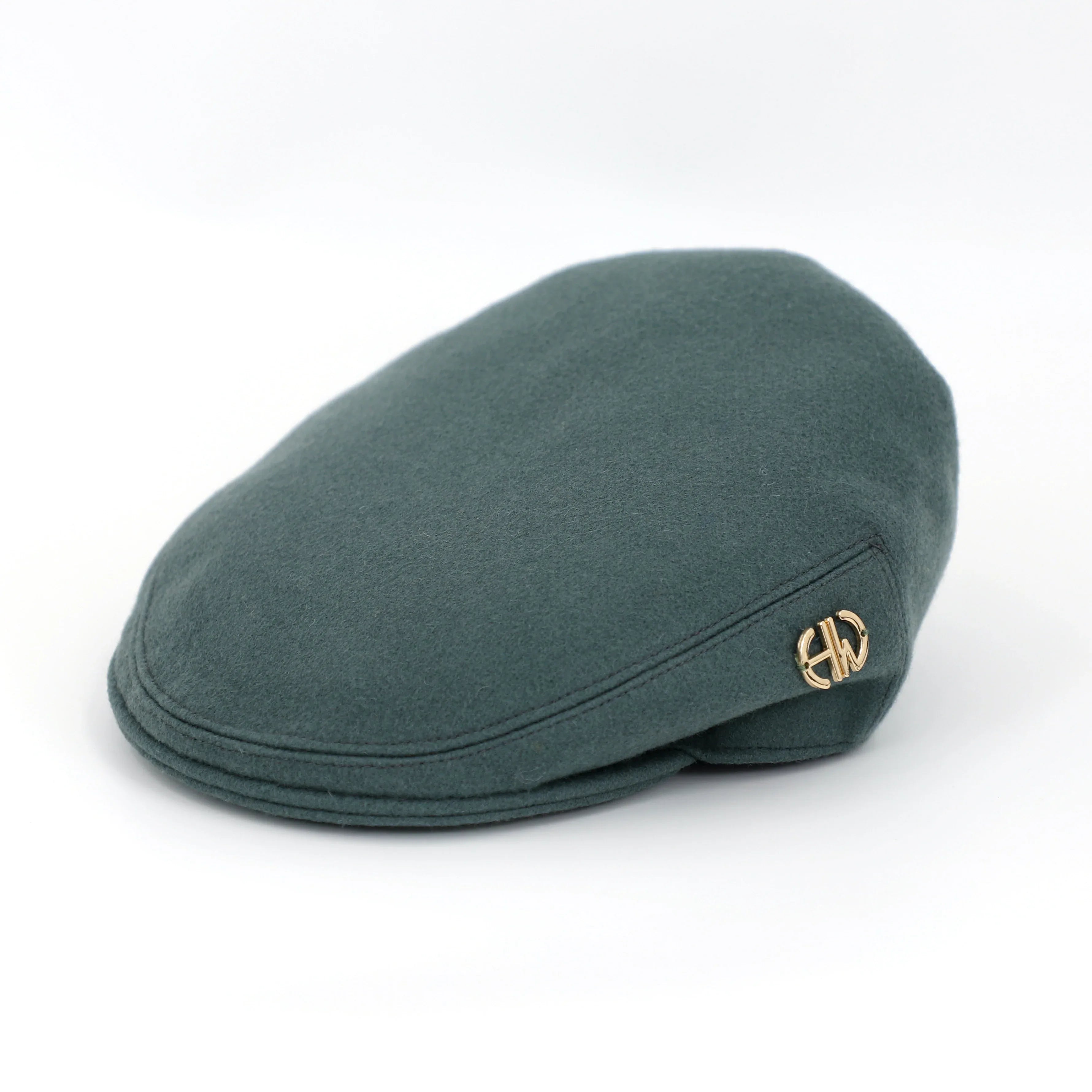 sage-coloured scally cap with HW logo side view