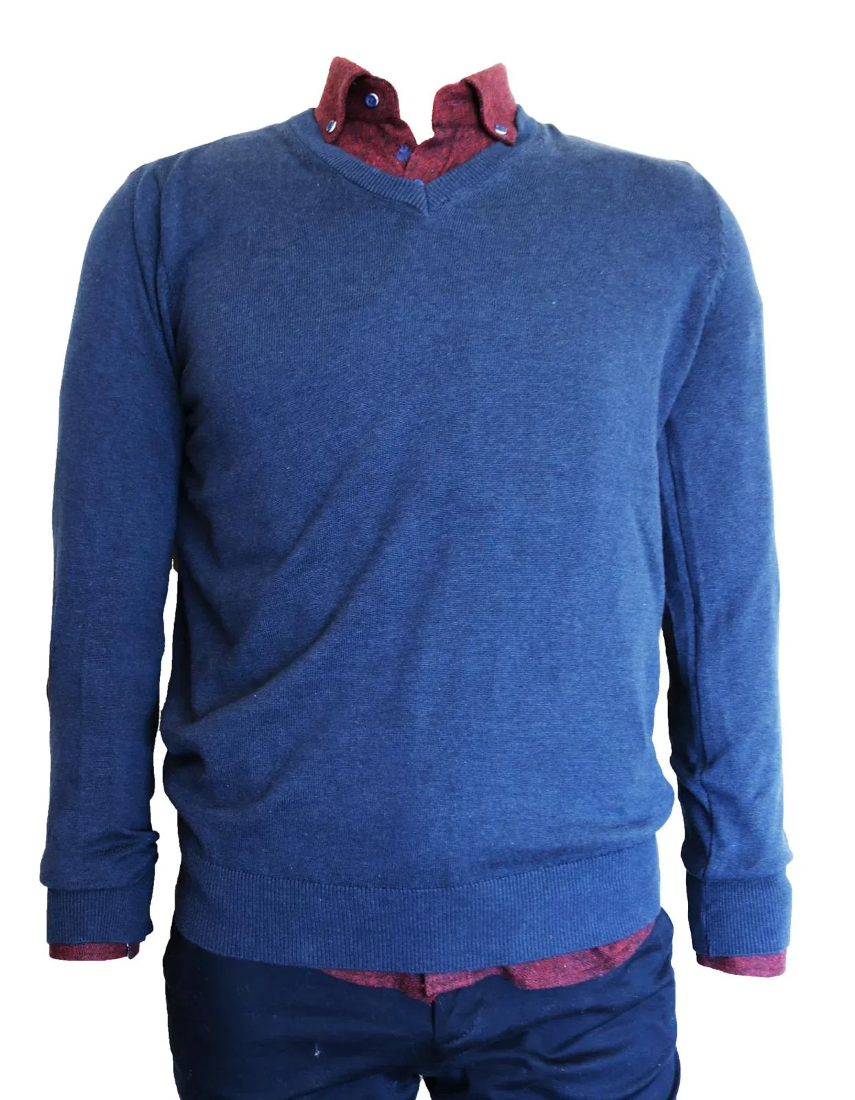 Blue sweater with red collar and cuffs on a white background