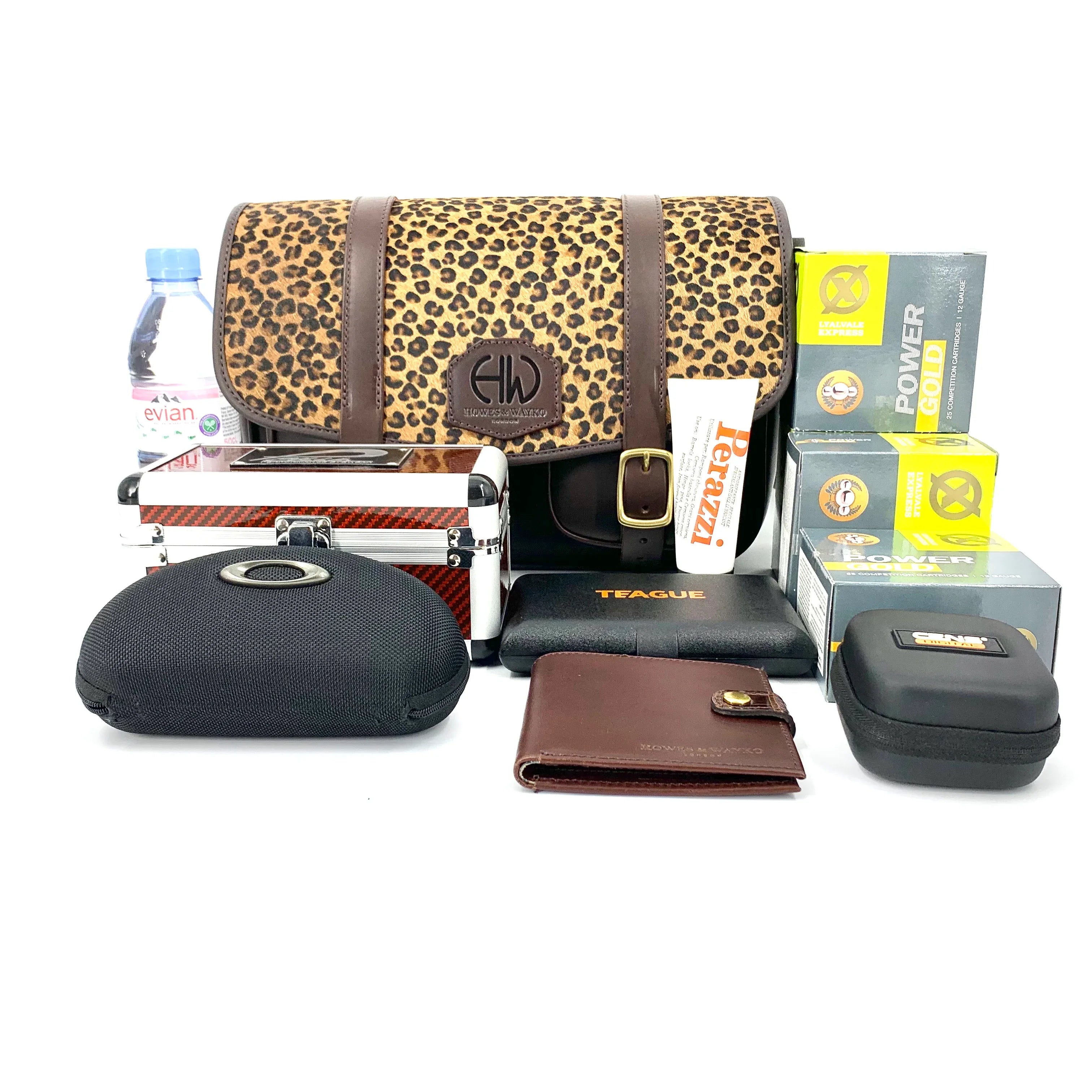 British Made Hera Abba Brown Cheetah - Shooting Cartridge Bag front view with other shooting accessories in view