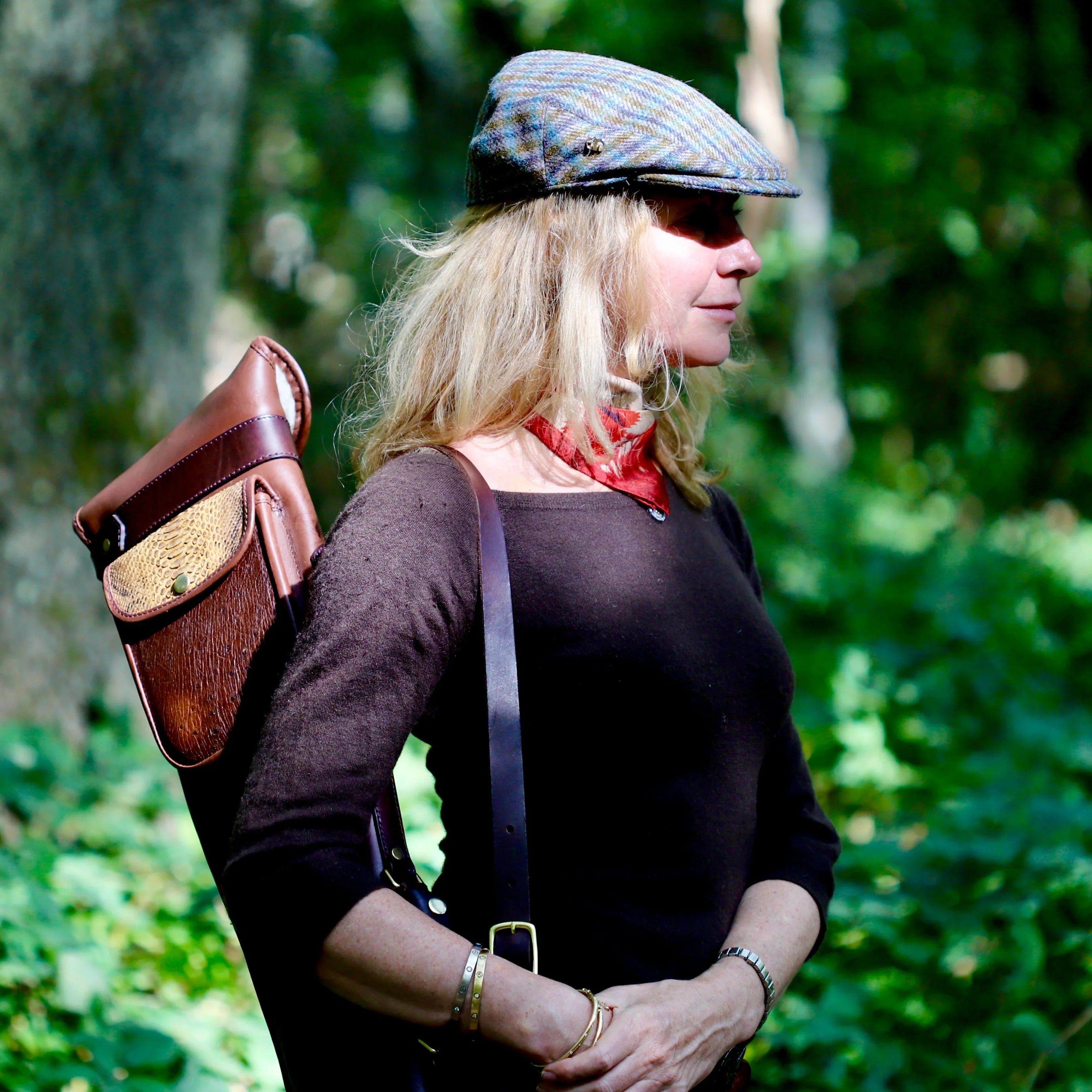 Elsa Scarf - Ladies Shooting Scarf showcased on a woman in the woods around her neck, shooting accessories