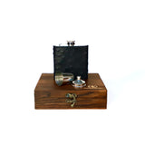 Black Stainless steel flask with black Ostrich leather, displayed on a wooden box with a brass latch against a white background