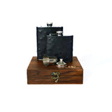 Black leather Ostrich leather flask set with a wooden box on a white background