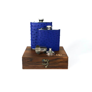 Blue  Ostrich flask with wooden box on a white background