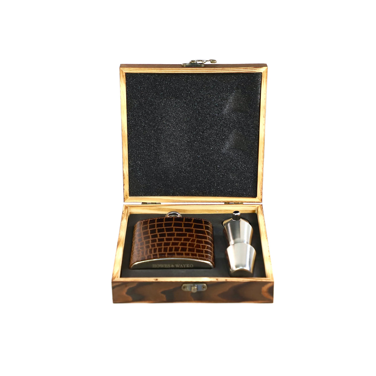 wooden gift box  with a 6oz stainless steel pocket flask, covered with brown embossed leather on a white background