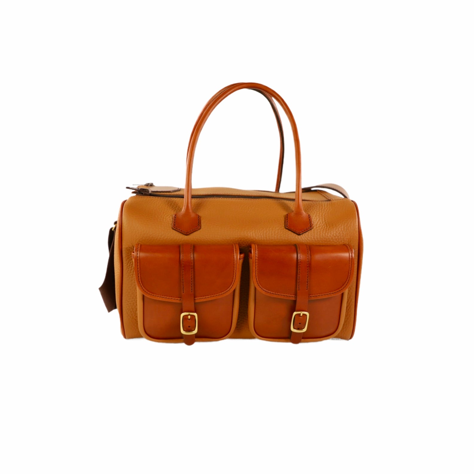 Tan leather bag with gold buckles on a white background