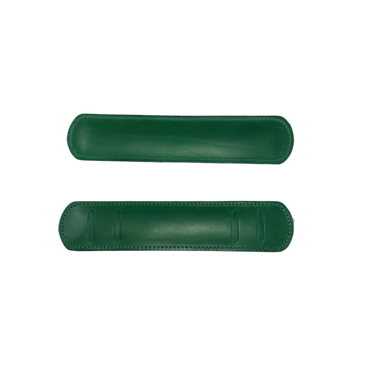 Shoulder strap pad in forest green veg-tanned leather on a white background