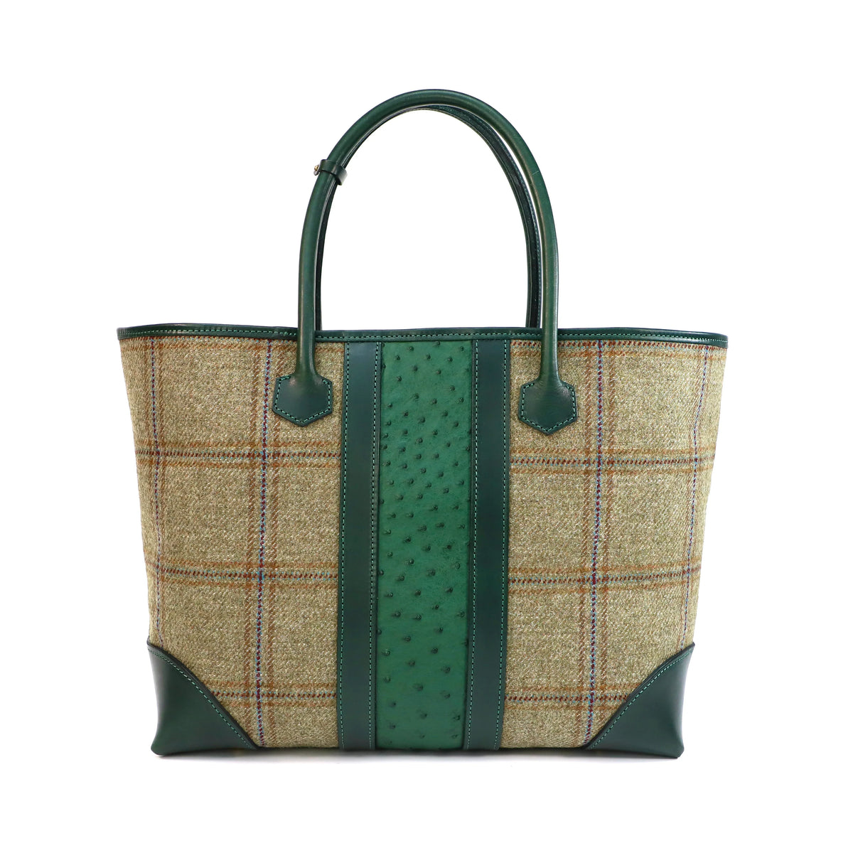 Tweed handbag with green accents on a white background