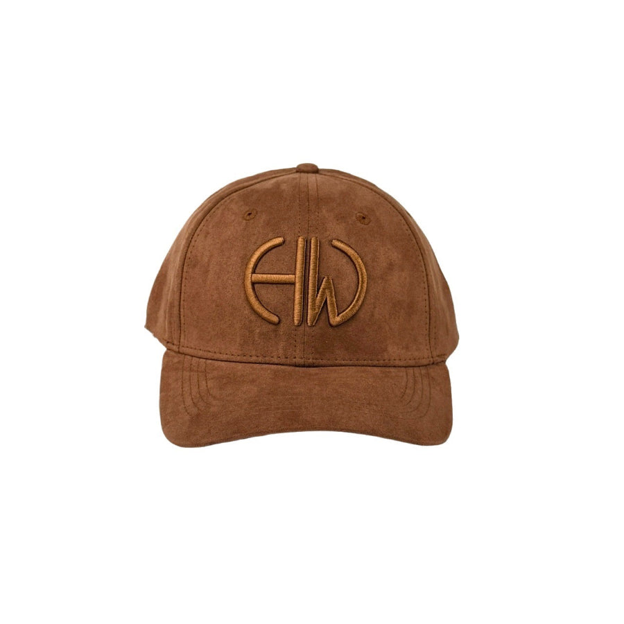 A cognac brown suede baseball cap with matching embroideried  Howes and Wayko logo on a white background.