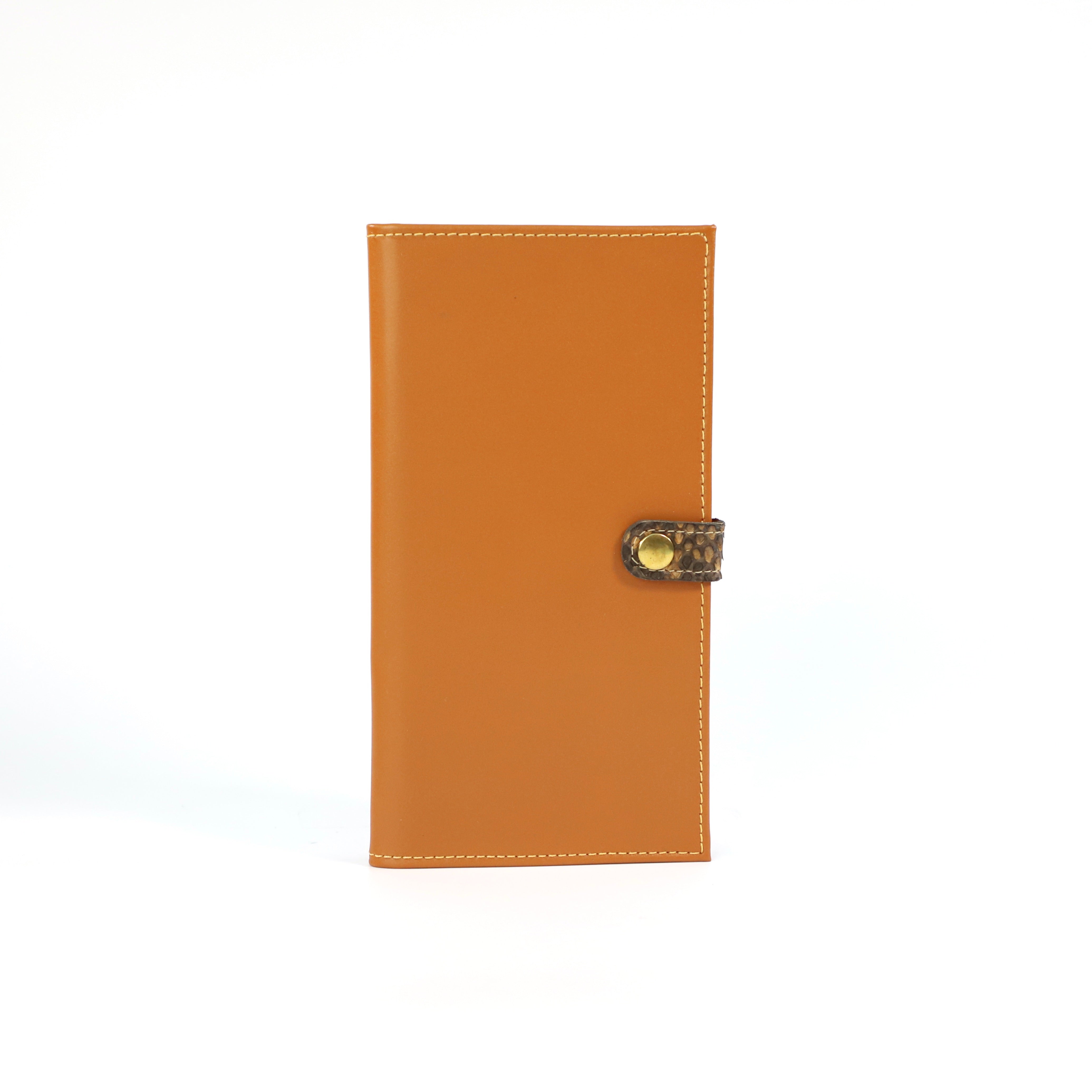 Light brown leather wallet  finished with a  brown snake clasp  and  gold snap on a white background