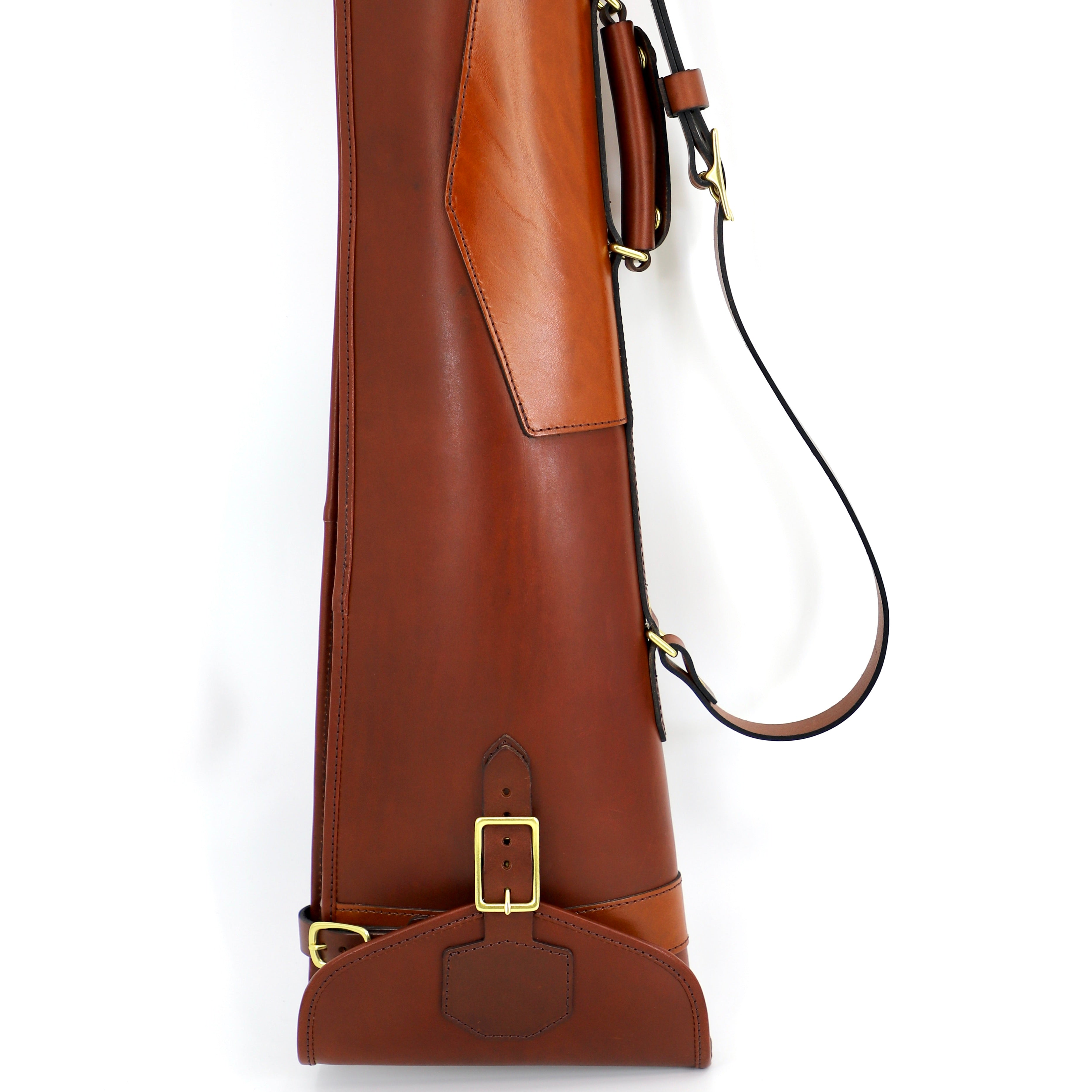 flip side of papaya tan leather gunslip and brass buckle