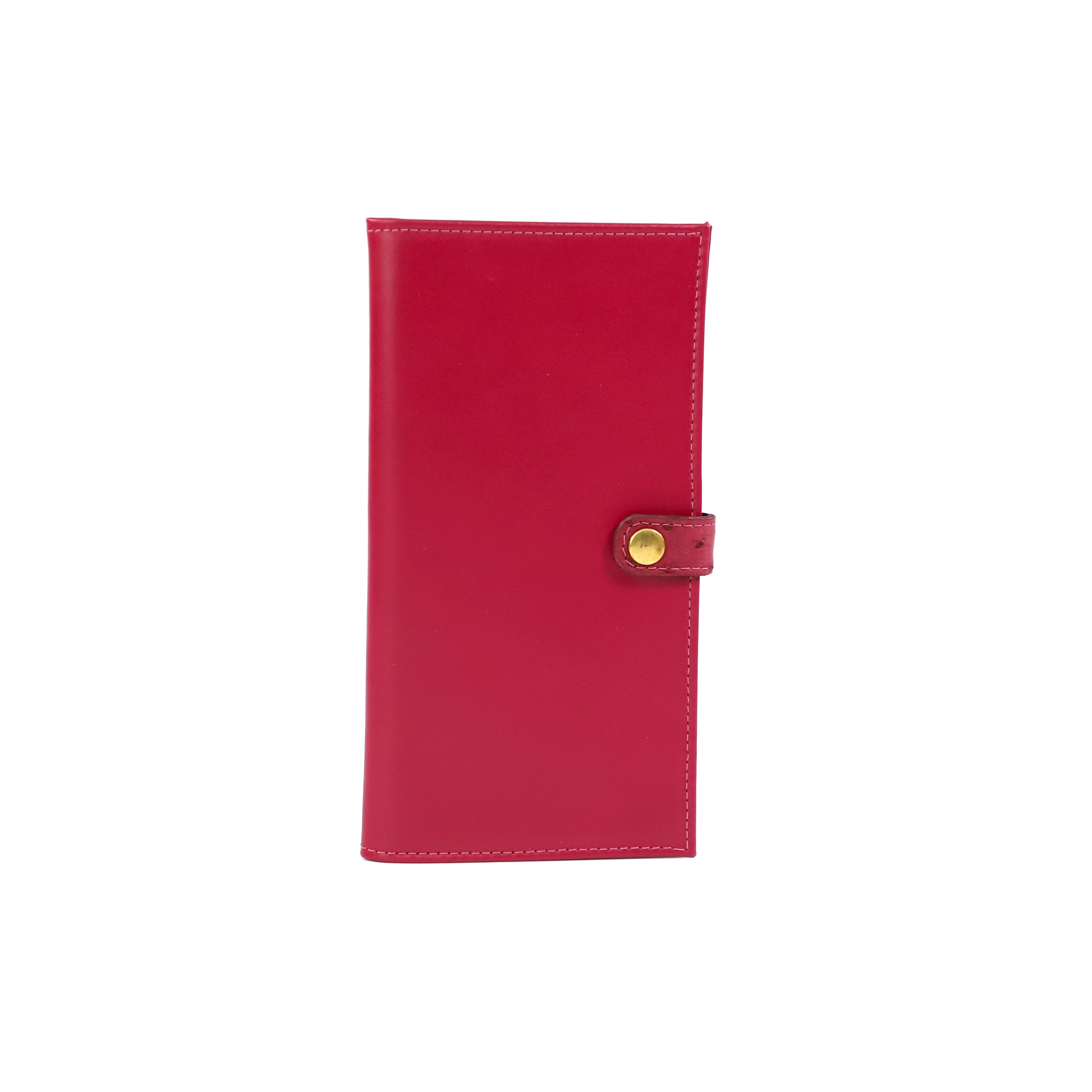 Pink leather certificate wallet with an Ostrich clasp and gold snap buckle on a white background