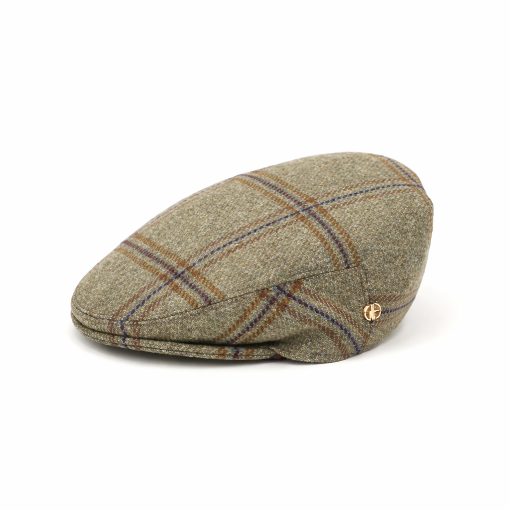 Plaid tweed patterned cap on a white background