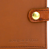 EOS-Tan Shotgun Certificate Holders close up of buckle and howes and wayko stamp