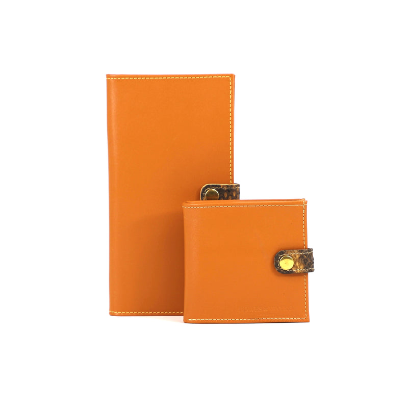 two mustard leather shotgun certificate wallet