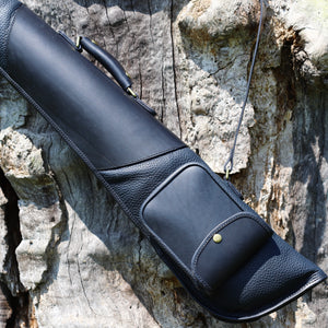 Leto Navy Gun Slip - Fleece Lined Leather Gun Protector. gun slip hanging up on wooden tree showcasing extra pocket pouch on the top of the navy gun slip