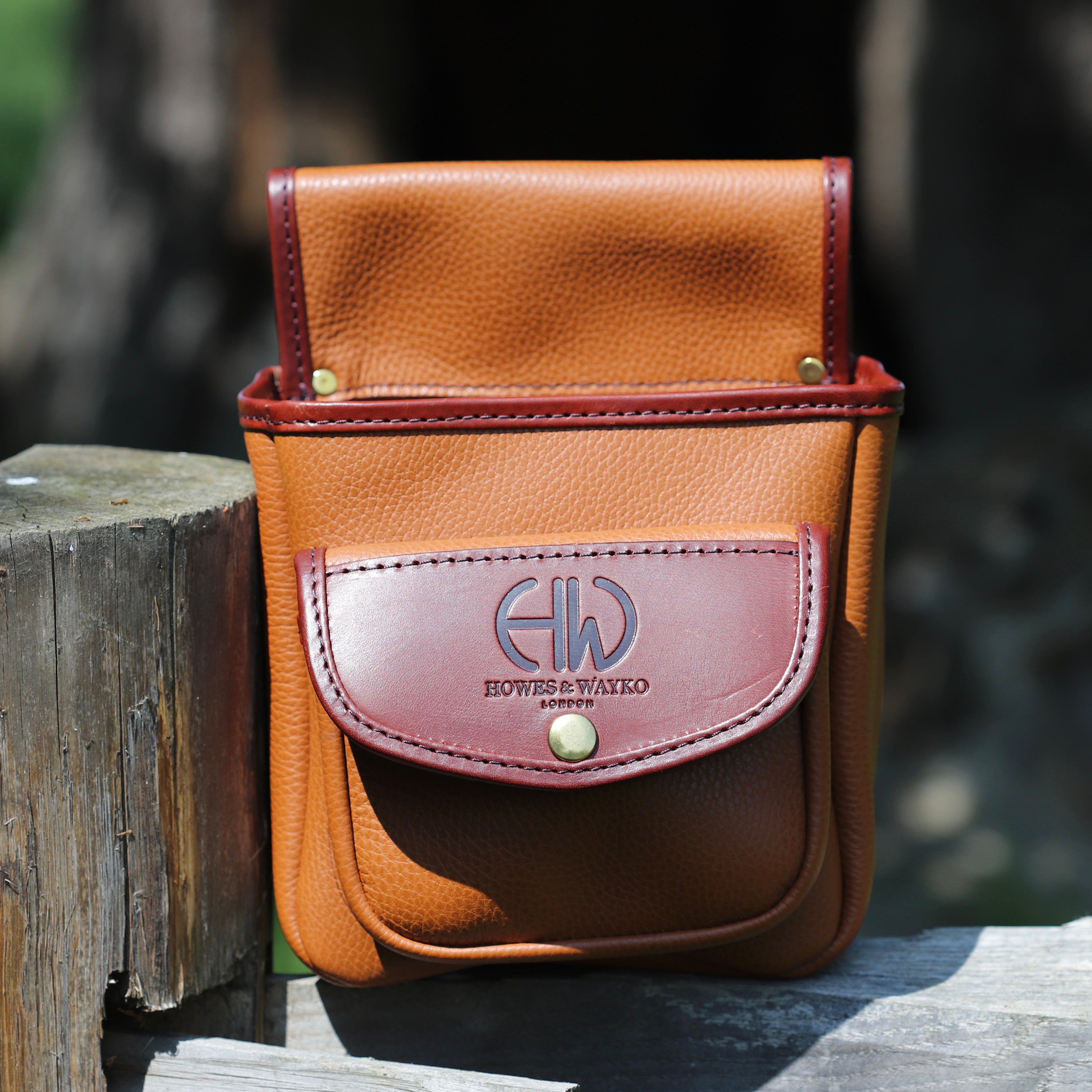 Hella Maggie Pouch, Cartridge Carrier - Shooting Accessories sitting on a fence