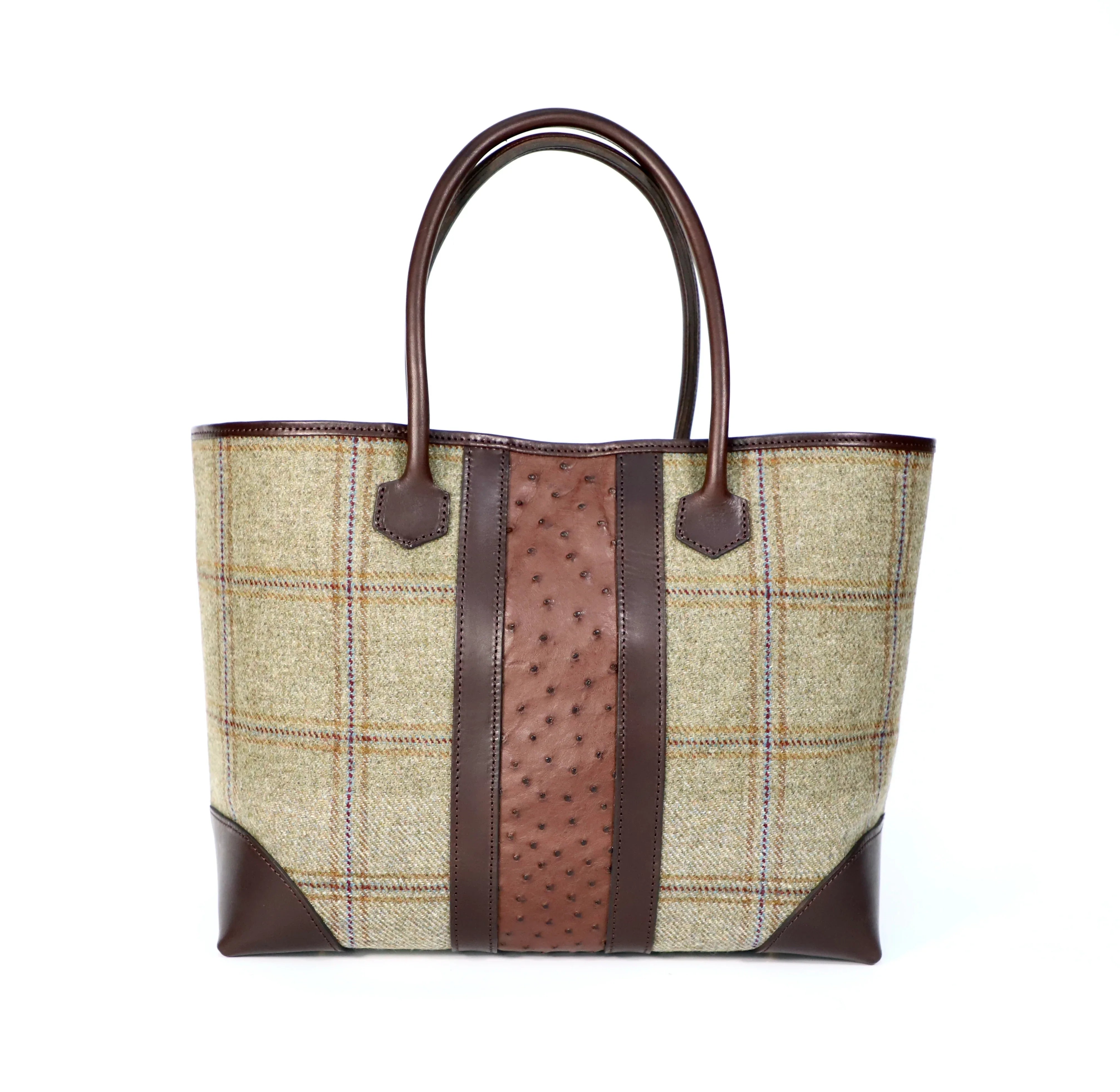 tweed tote with plaid pattern and brown leather accents on a white background
