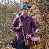 Cotton Jumper Aubergine - Premium Shooting Clothing adorned on a man in the field, the man is also using up other shooting accessories for a full gear