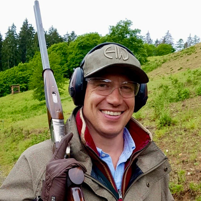 Iris Olive Green Baseball Cap - Shooting Baseball Caps adorned on a man in the outdoors